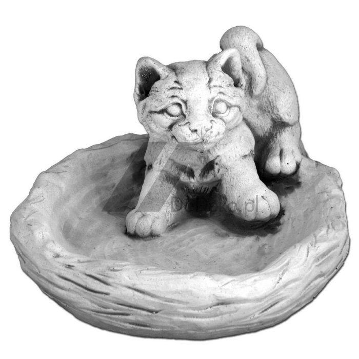 A drinking bowl for animals with a figure of a kitten