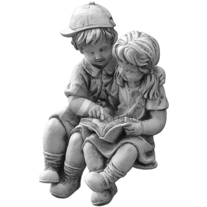 Figurines of children with a book