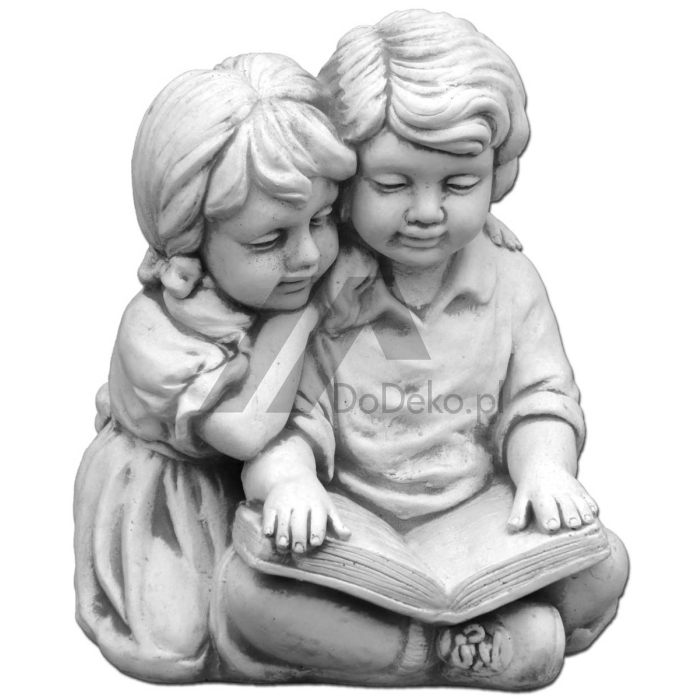 Sculpture of children with a book - decorative sculpture made of concrete